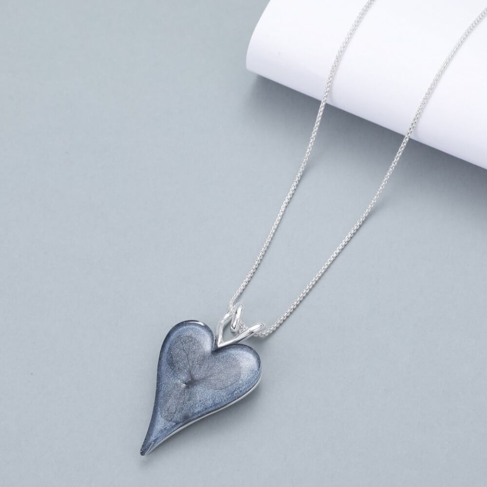 Silver Tone and Shimmery Blue Heart Pendant with Preserved Petals