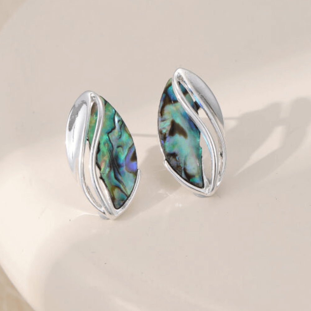 silver tone curving leaf shape earrings with abalone shell