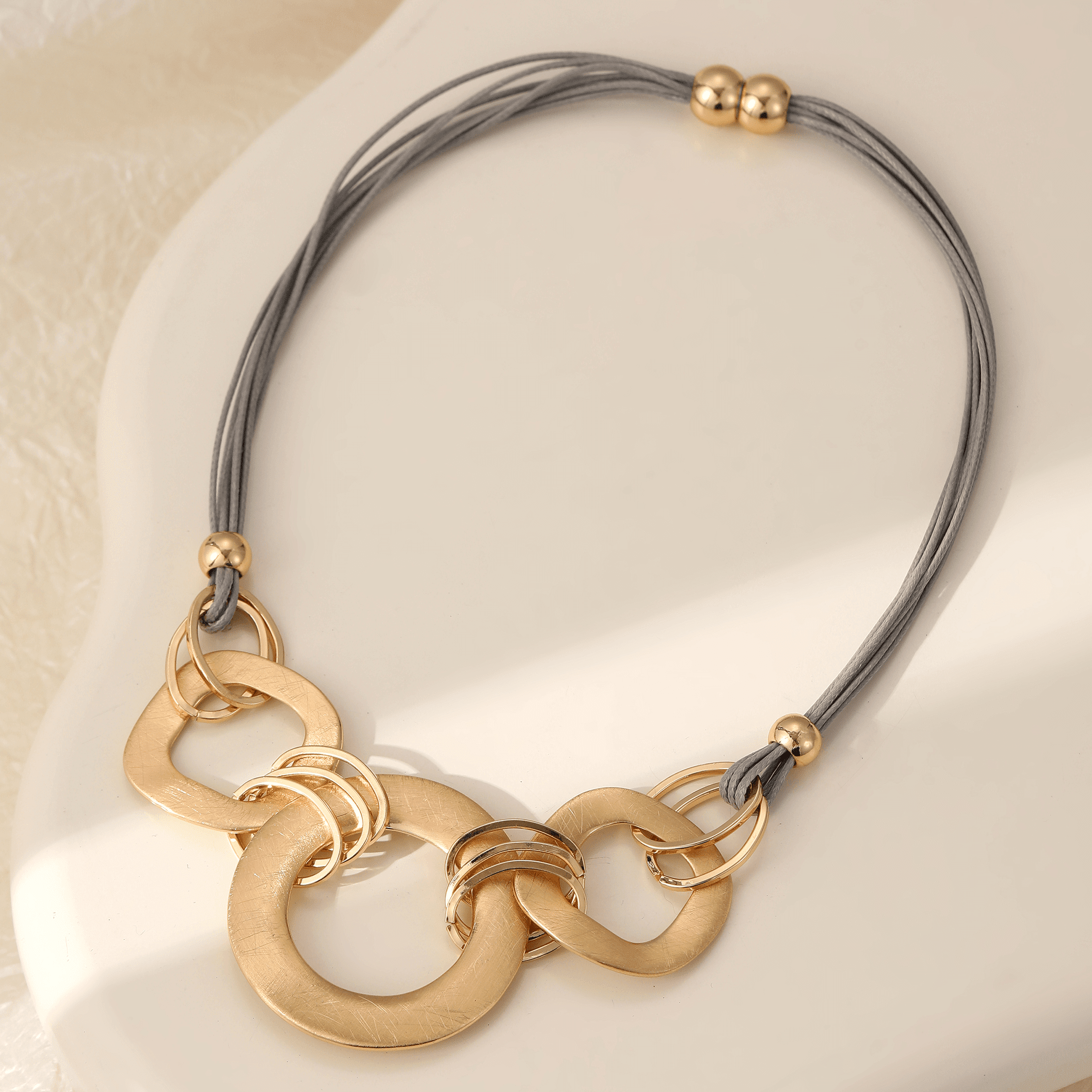 Magnetic Necklace with Grey Cord and Scratch-Finish Gold Statement Loops (M121)G)
