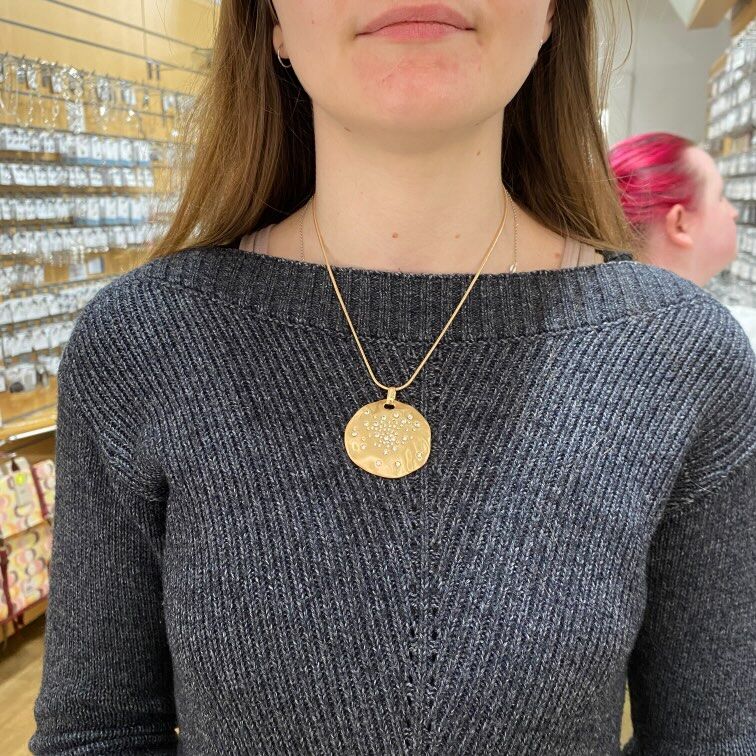 Gold Tone Necklace with Dimpled Pendant Studded With Crystals (M406)