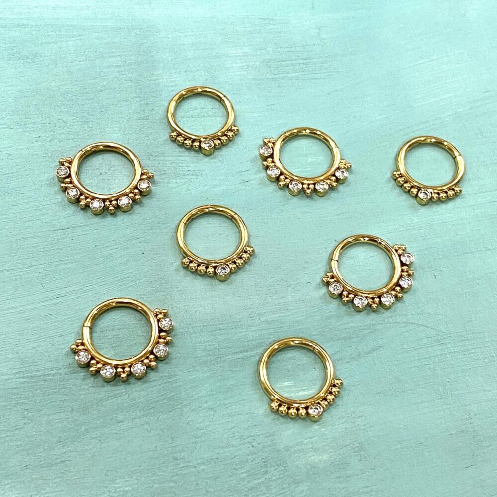 Gold Zircon Titanium Hinged Clicker Ring with Crystals and Tri-Bead Clusters