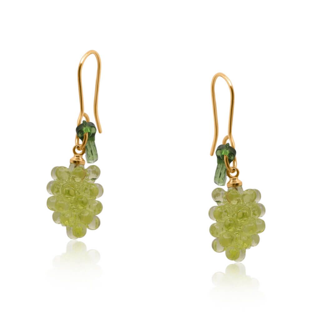 hese beautiful handcrafted grapes dangle earrings feature vibrant colours, making them a standout piece in any jewellery collection. Offering a contemporary blend of elegance and boldness, they’re perfect for elevating both everyday and special occasion looks. Crafted with sustainability in mind, at least 50% of the brass we use in the jewellery is recycled from leftover/overhead materials. All posts are hypoallergenic and made from surgical steel.